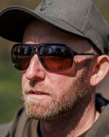 Fox AV8 Polarized Glasses Black Frame Camo Arms Brown